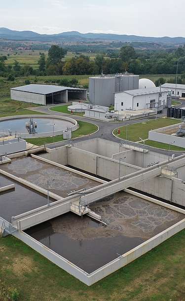 A modern facility designed to treat and purify municipal wastewater, featuring sedimentation tanks, aeration basins, and advanced treatment units to ensure environmental protection and water quality.